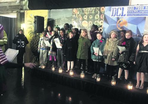 The Xtra Diary: School chorus steals the show as Joanna Lumley lights up the Save Soho campaign in Berwick Street Soho parish school choir