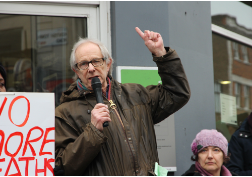 Seeing red: flying flag for left-wing movie club Ken Loach fit to work Lawrence Bond vigil