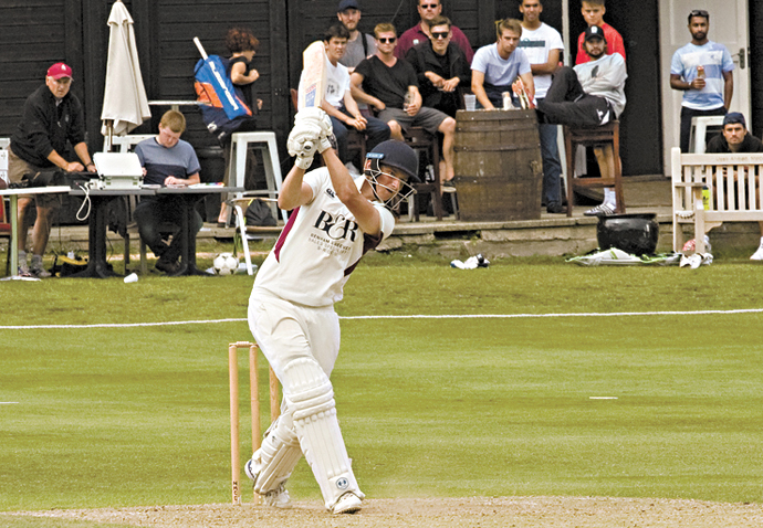 Luke Hollman hits Dave Burton for 4 -credit Conrad Williams