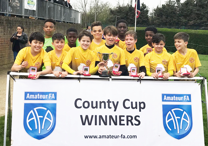 Three cheers for three trophies after Town’s dramatic comeback Kentish Town