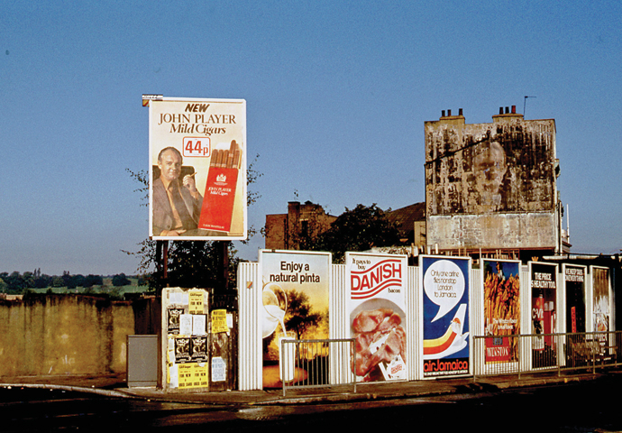 Advertising signs on Kentish Town Road now Regis Road