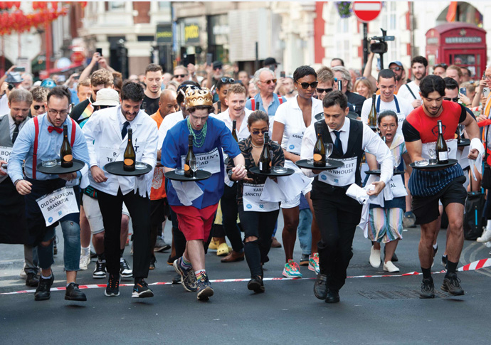 Townhouse dreaming of a hat-trick win in waiters’ race Soho Fete_Waiters Race Start 2