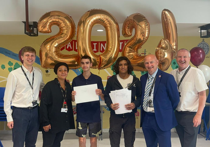 Students prepare for their ‘next chapters’ Staff incl Headteacher Mr Ardron with top achieving students